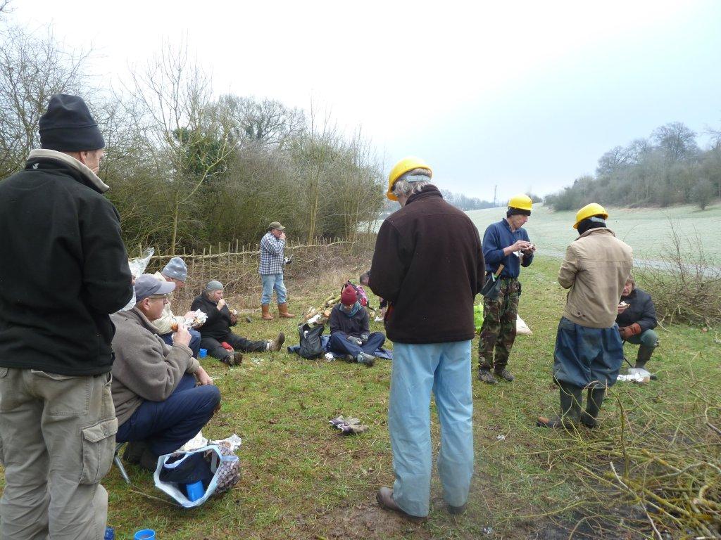 Lunch including baked potatoes cooked on the bonfire