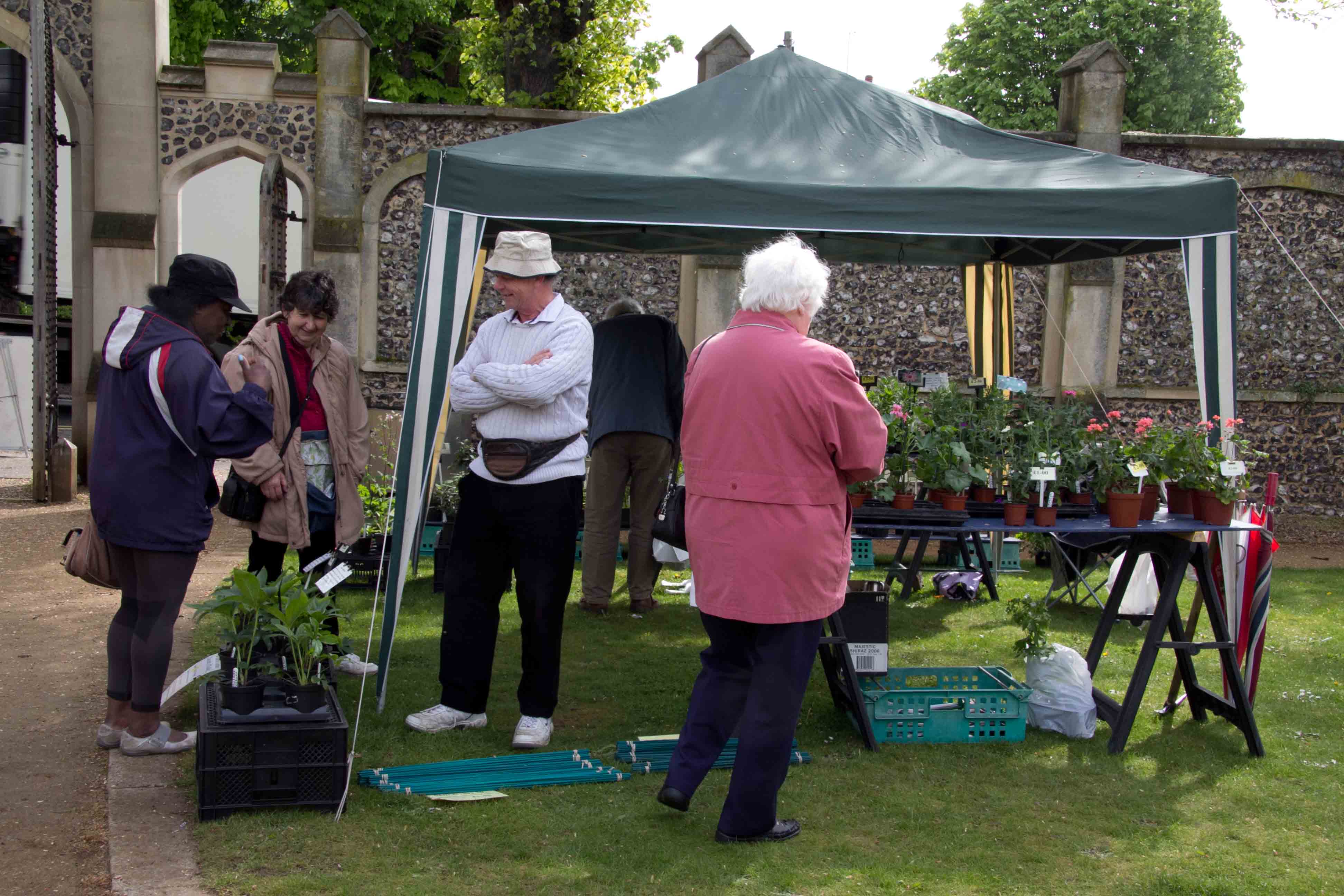 Potential customers check out the plants